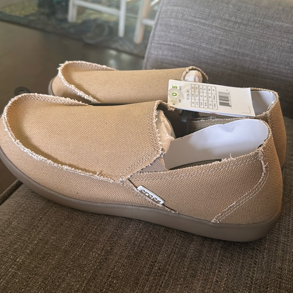 Brand new Size 13 Crocs slip ons